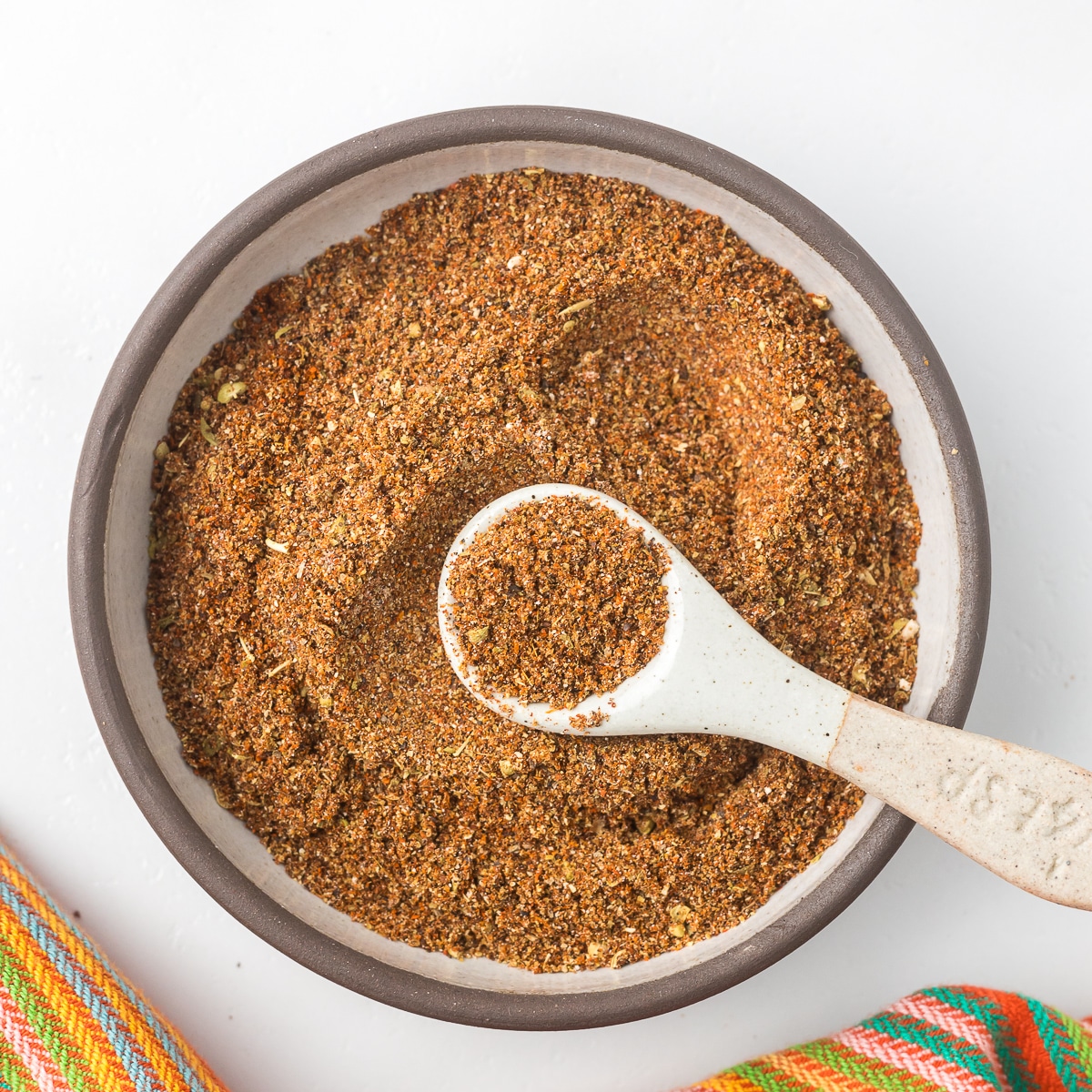 No Salt Taco Seasoning in a bowl with a measuring spoon.