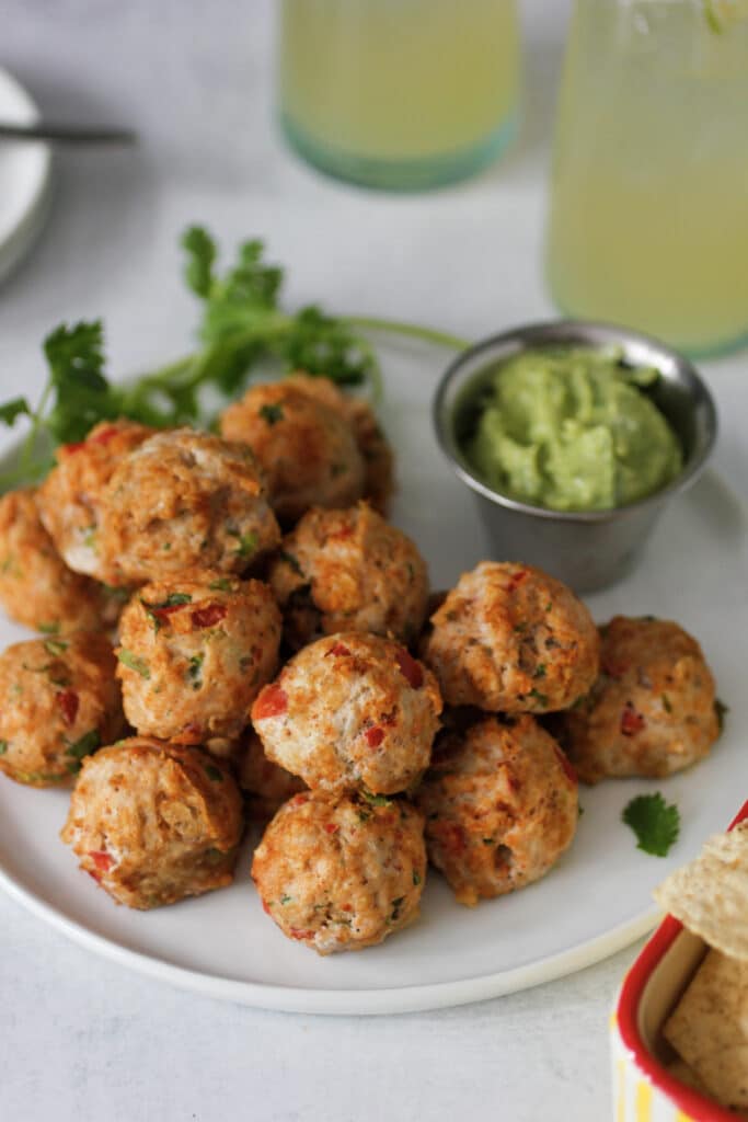southwest chicken meatballs with avocado cream sauce for dipping and margaritas.