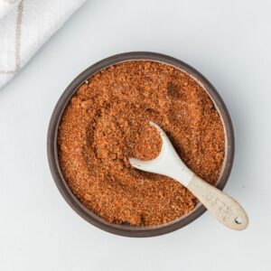 BBQ Spice Rub in a small bowl with a spoon.