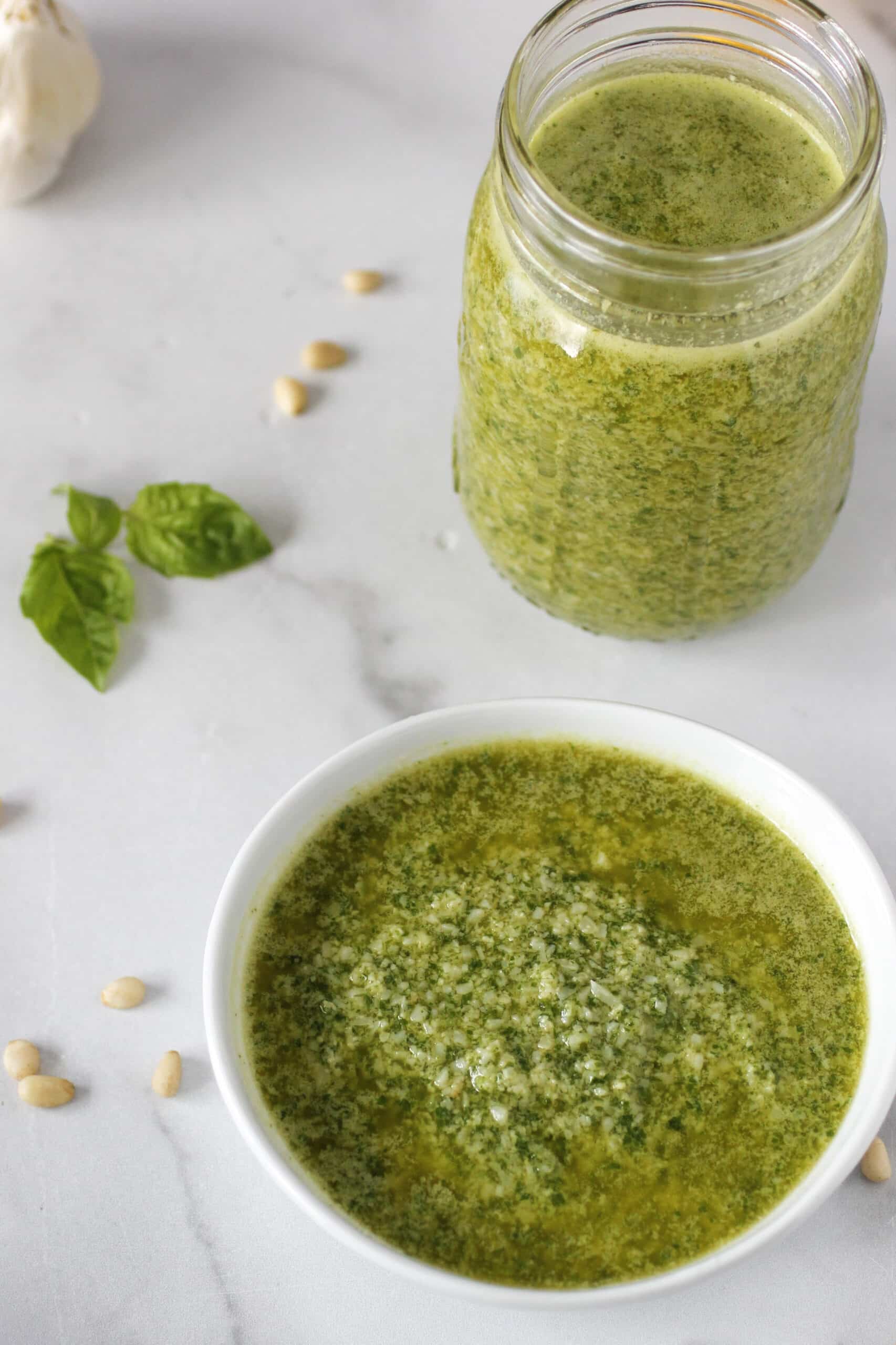 Pesto in a white bowl.