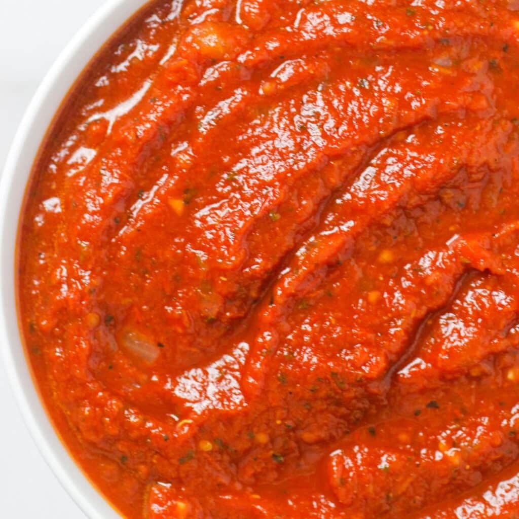 Hearty Marinara Sauce in a white bowl.