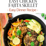 onions and peppers with chicken in skillet to create a fajita dinner with avocado and cilantro