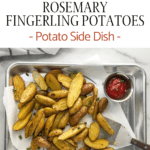 Rosemary Fingerling Potatoes on a cookie sheet with ketchup