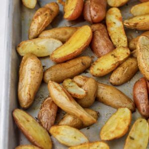 Roasted Fingerling potatoes on a cookie sheet right out of the oven