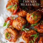 Orange Chicken Meatballs with green onions as garnish.