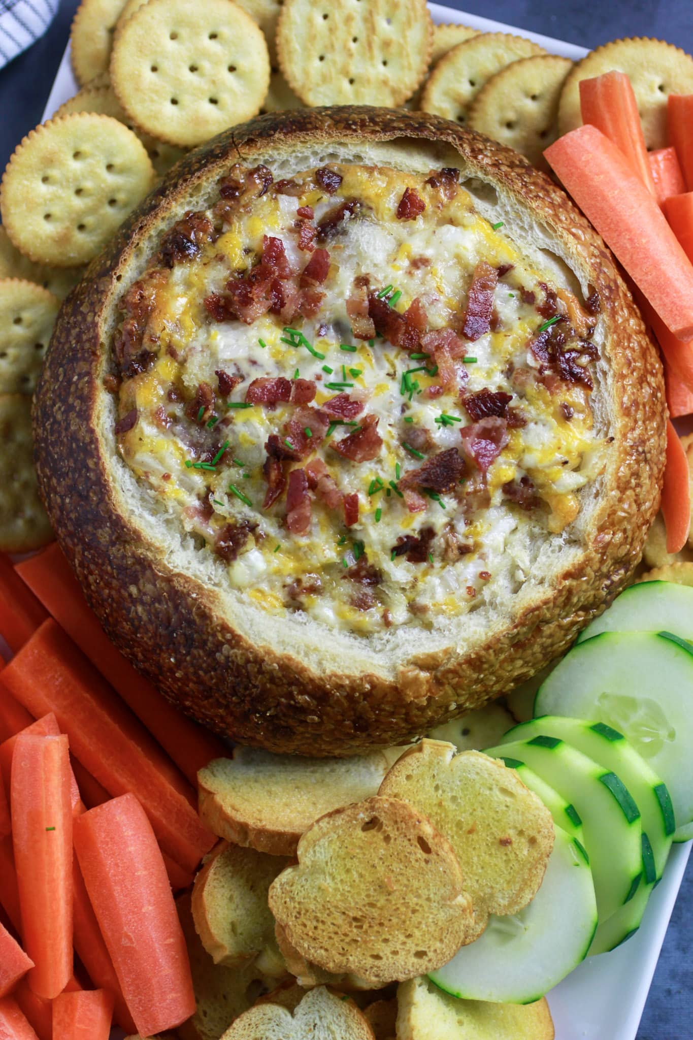 Cheesy Bacon Dip Appetizer in bread bowl.