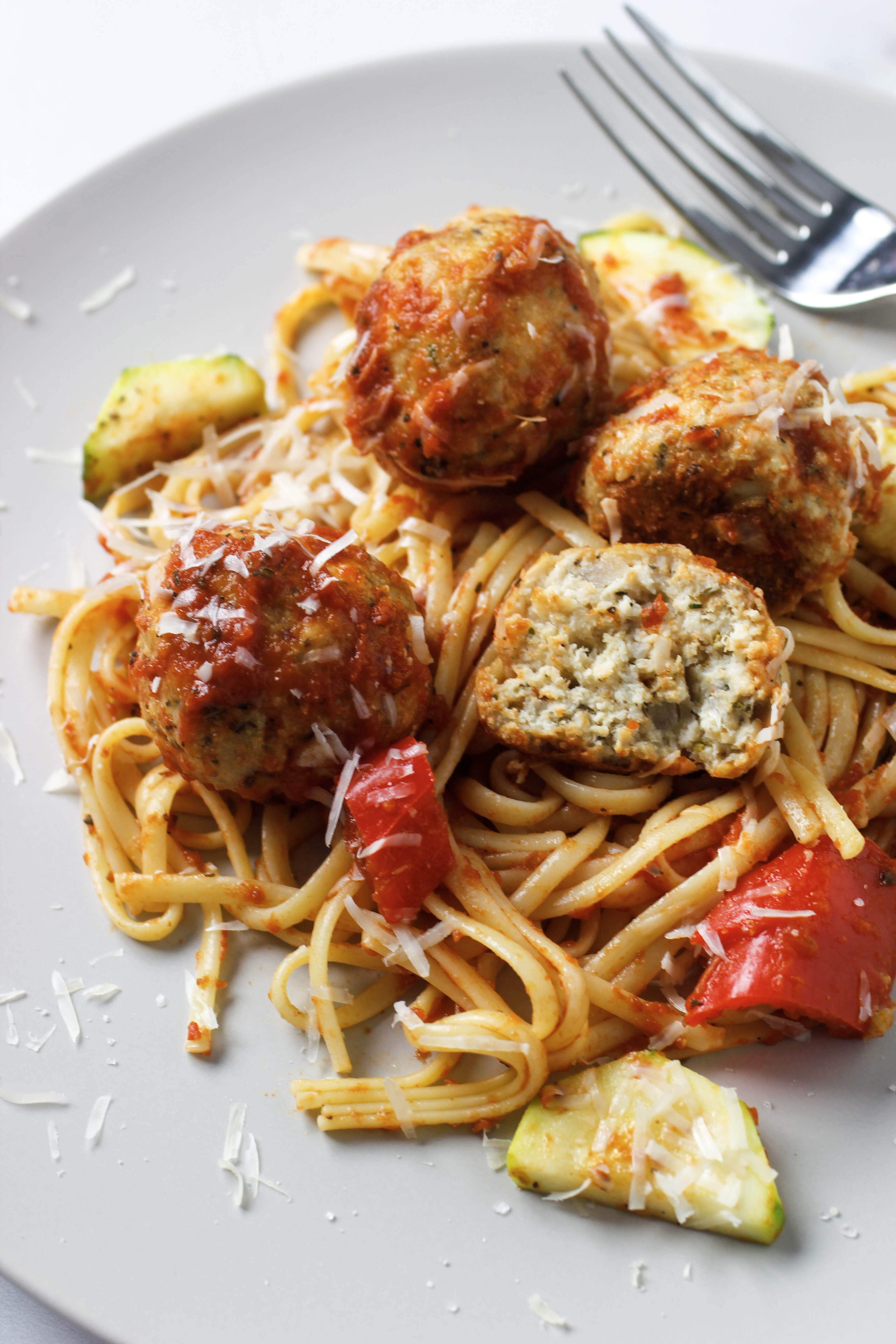 Italian Meatballs with classic marinara over spaghetti.
