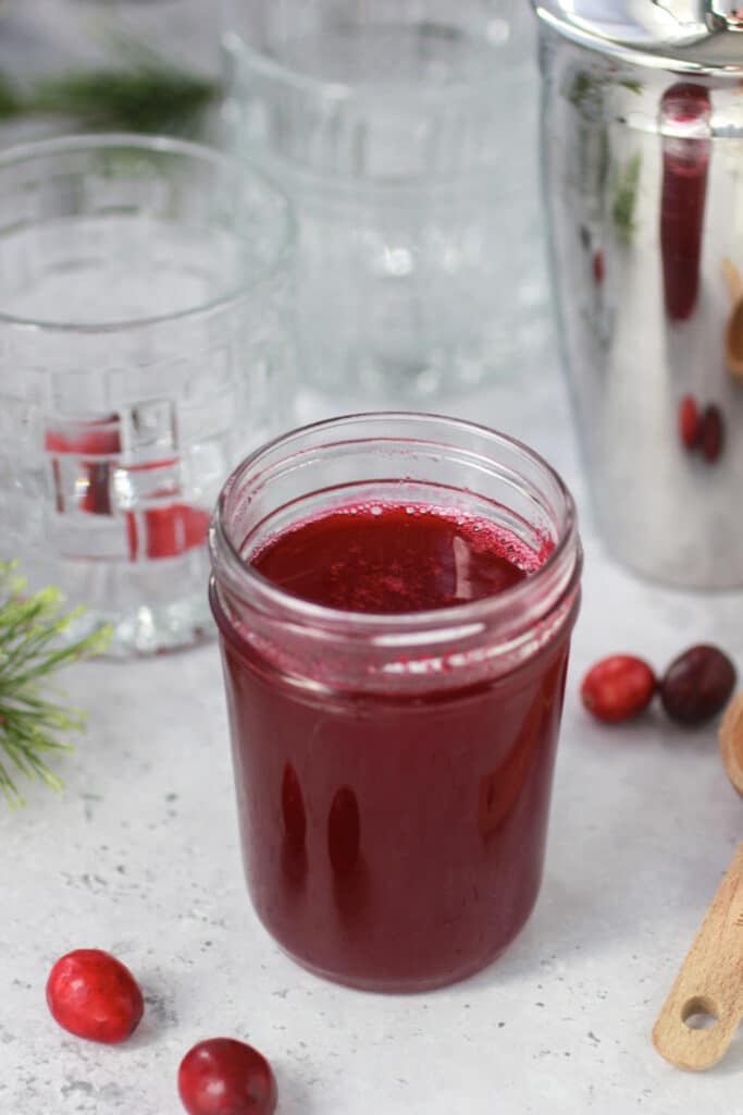Cranberry Simple Syrup in a jar.
