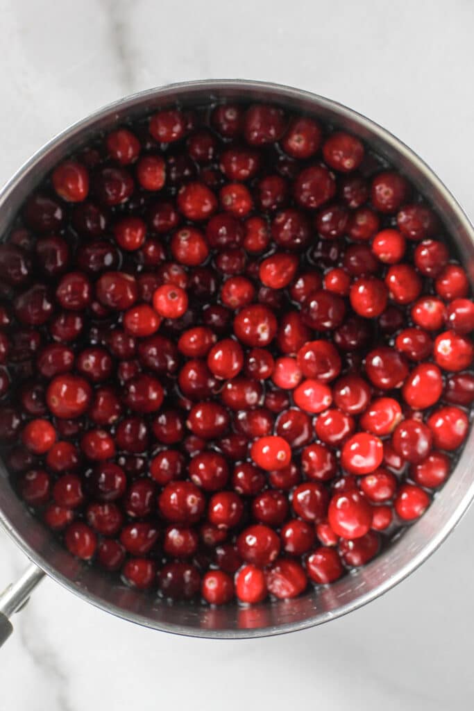 Cranberries in a sauce pan.