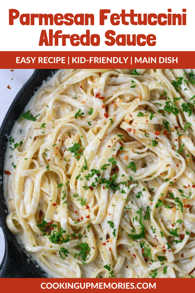 Parmesan Fettuccine Alfredo Sauce in a skillet with parsley and red pepper flakes.