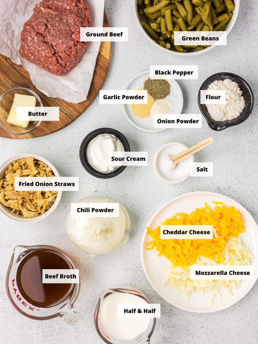 Ingredients to make hamburger green bean casserole dinner in individual bowls on a counter top.
