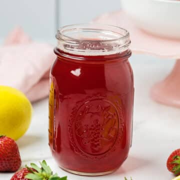 Strawberry Simple syrup in a jar.