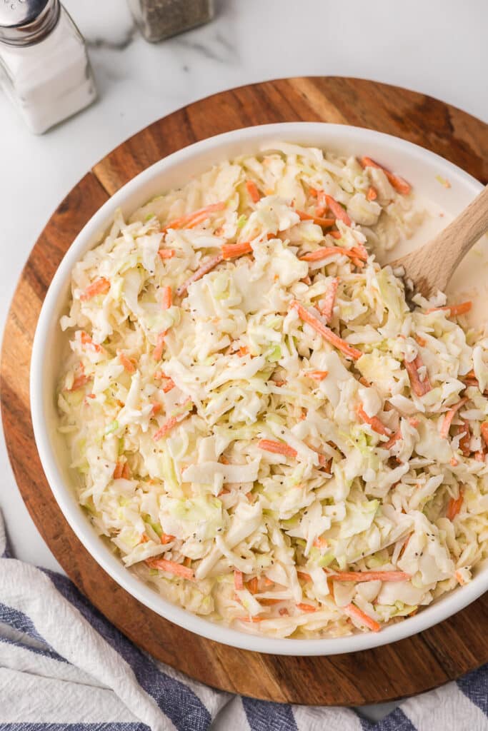 Creamy Coleslaw in a white bowl.