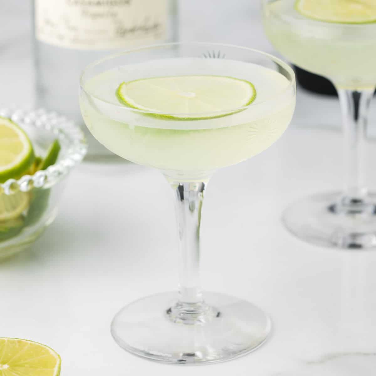 Tequila Gimlet with a lime wheel.
