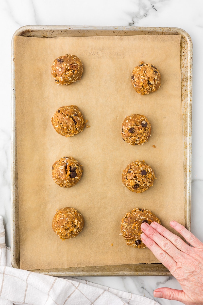 Cookies on a baking sheet before baking.