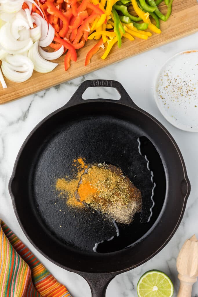 Cast iron skillet with spices.