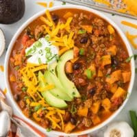 Beef and chorizo chili with toppings.