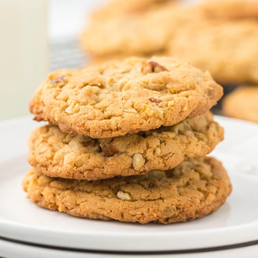 A stack of three Coconut Pecan Cookies.