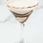 Almond Joy Martini with a chocolate rimmed up with coconut.