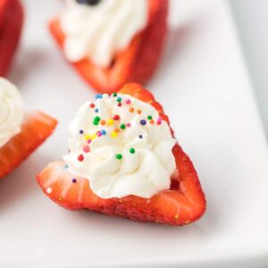 Deviled Strawberries on a white serving dish.