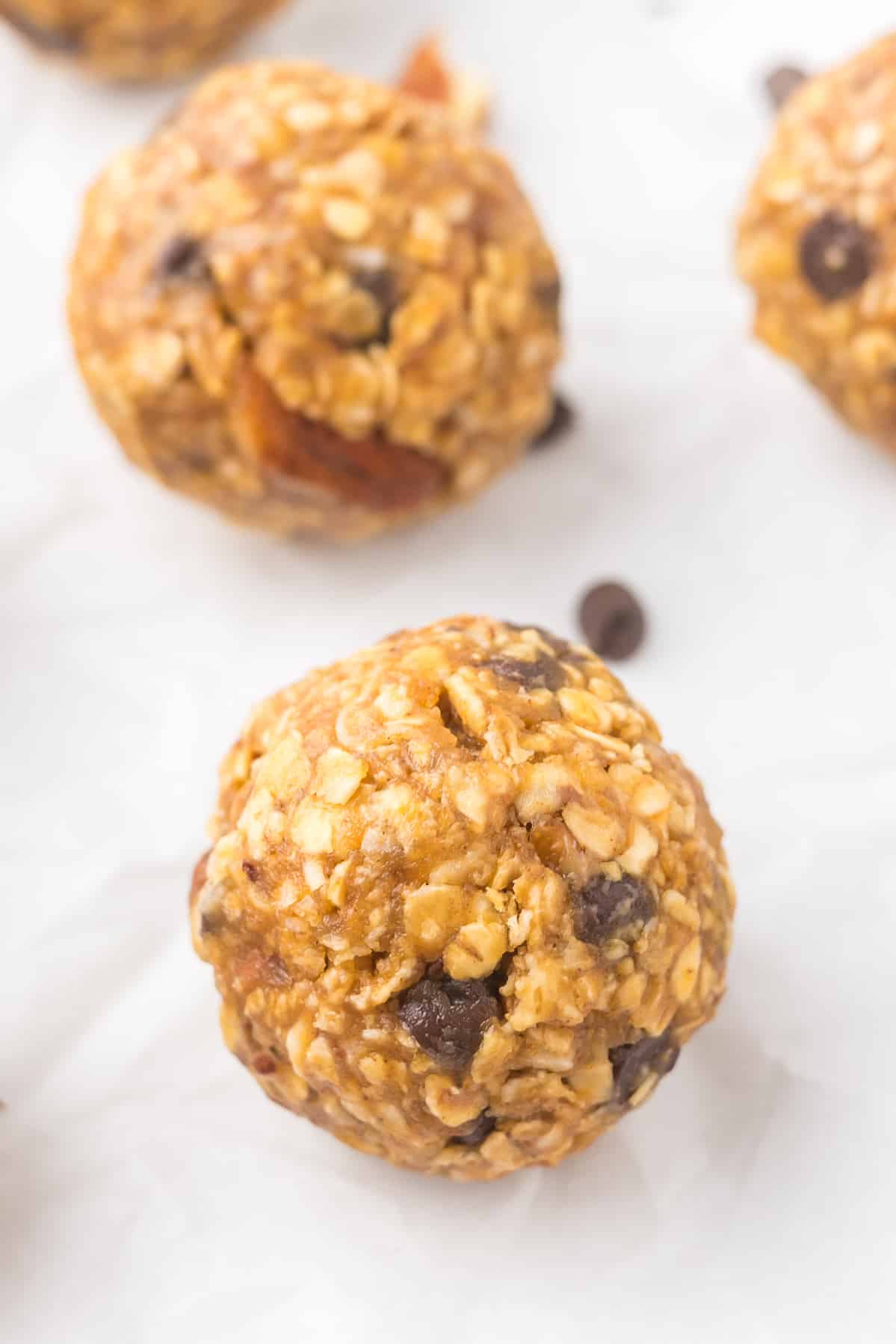 Pumpkin protein ball on parchment paper.