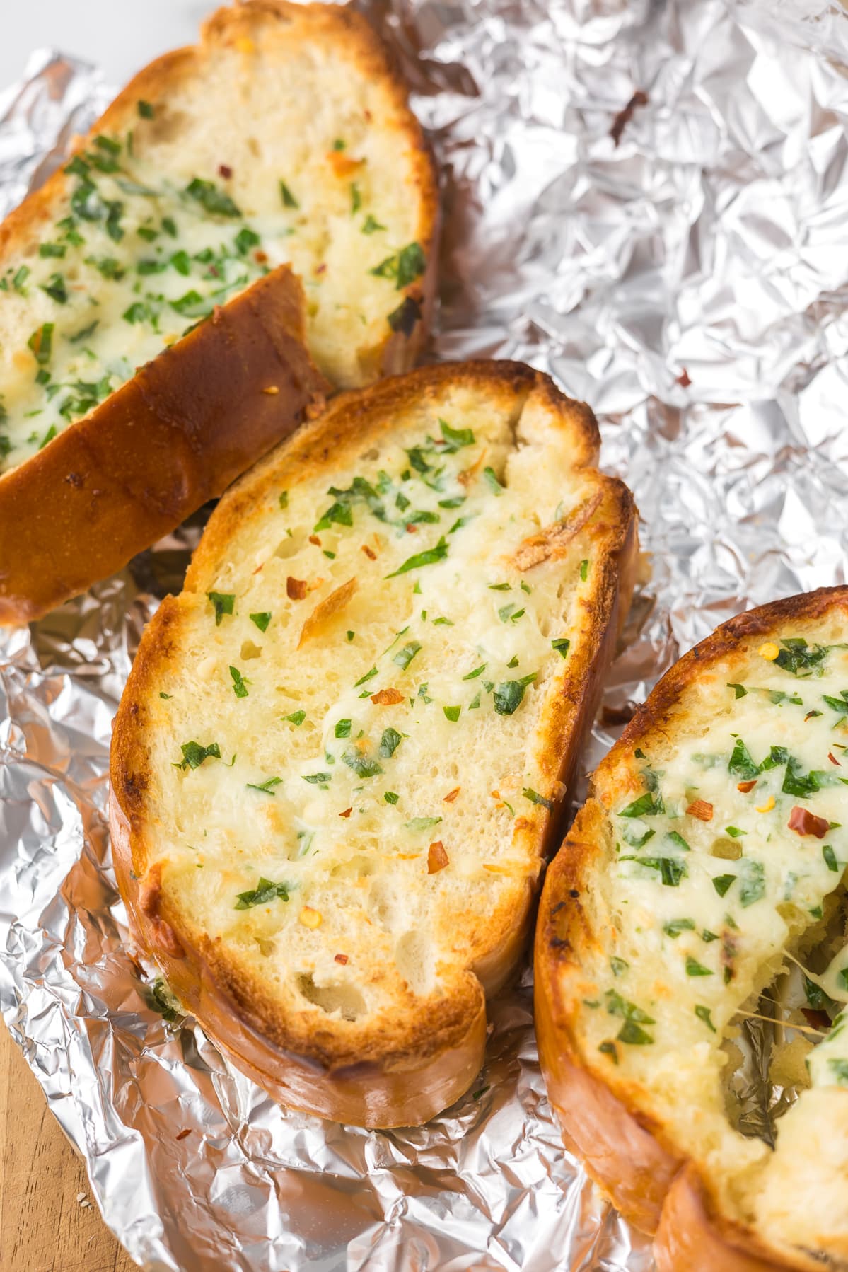 Stuffed Cheesy Garlic Toast on a piece of foil.