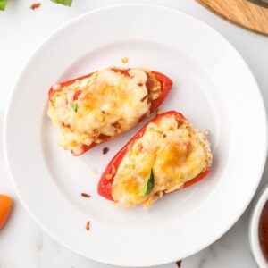 Italian Stuffed Mini Peppers with Sausage on a white plate.