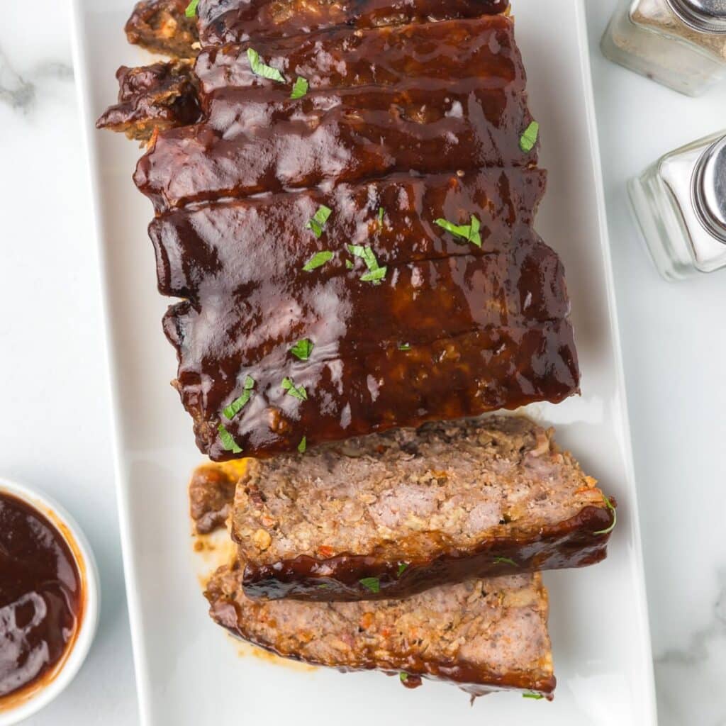Meatloaf with BBQ Sauce on a platter.