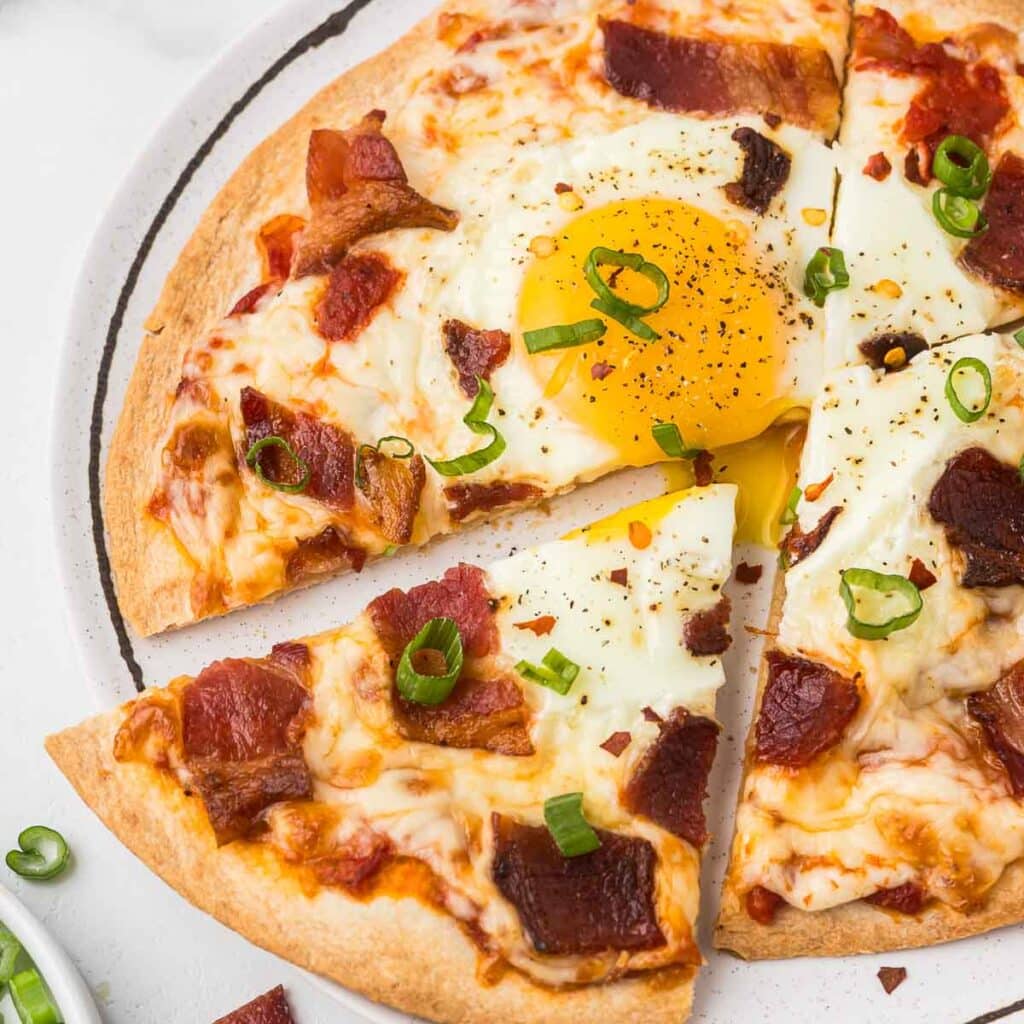 Breakfast Tortilla Pizza with egg and bacon.