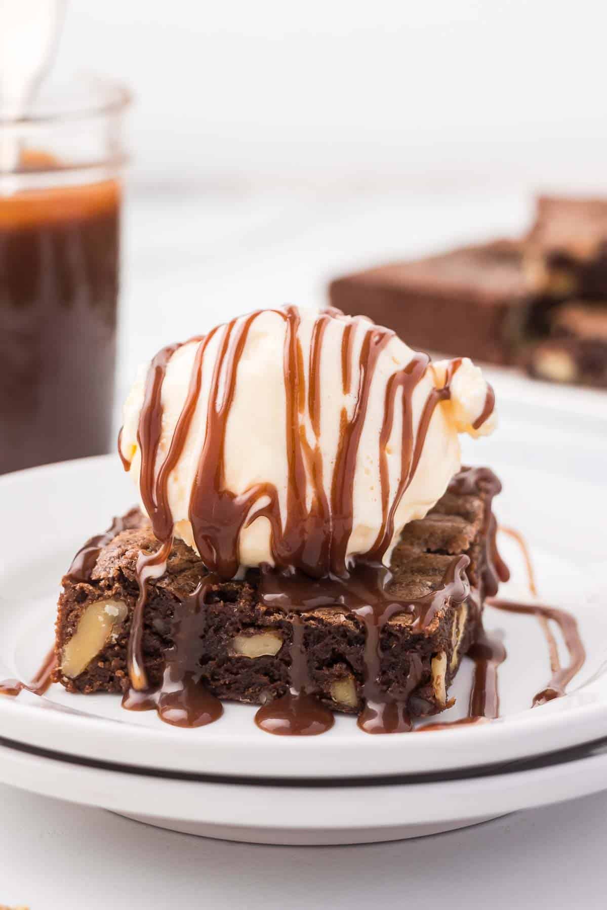 Brownie with hot fudge and ice cream.