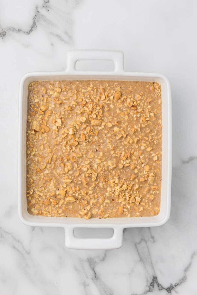Baked Oatmeal in a white dish before baking.