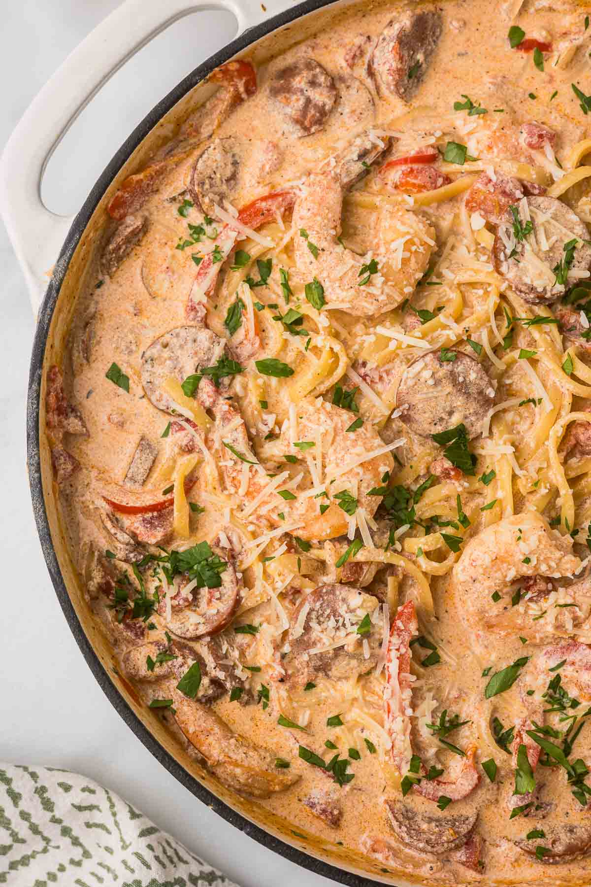 Cajun shrimp and sausage pasta in a dutch oven.