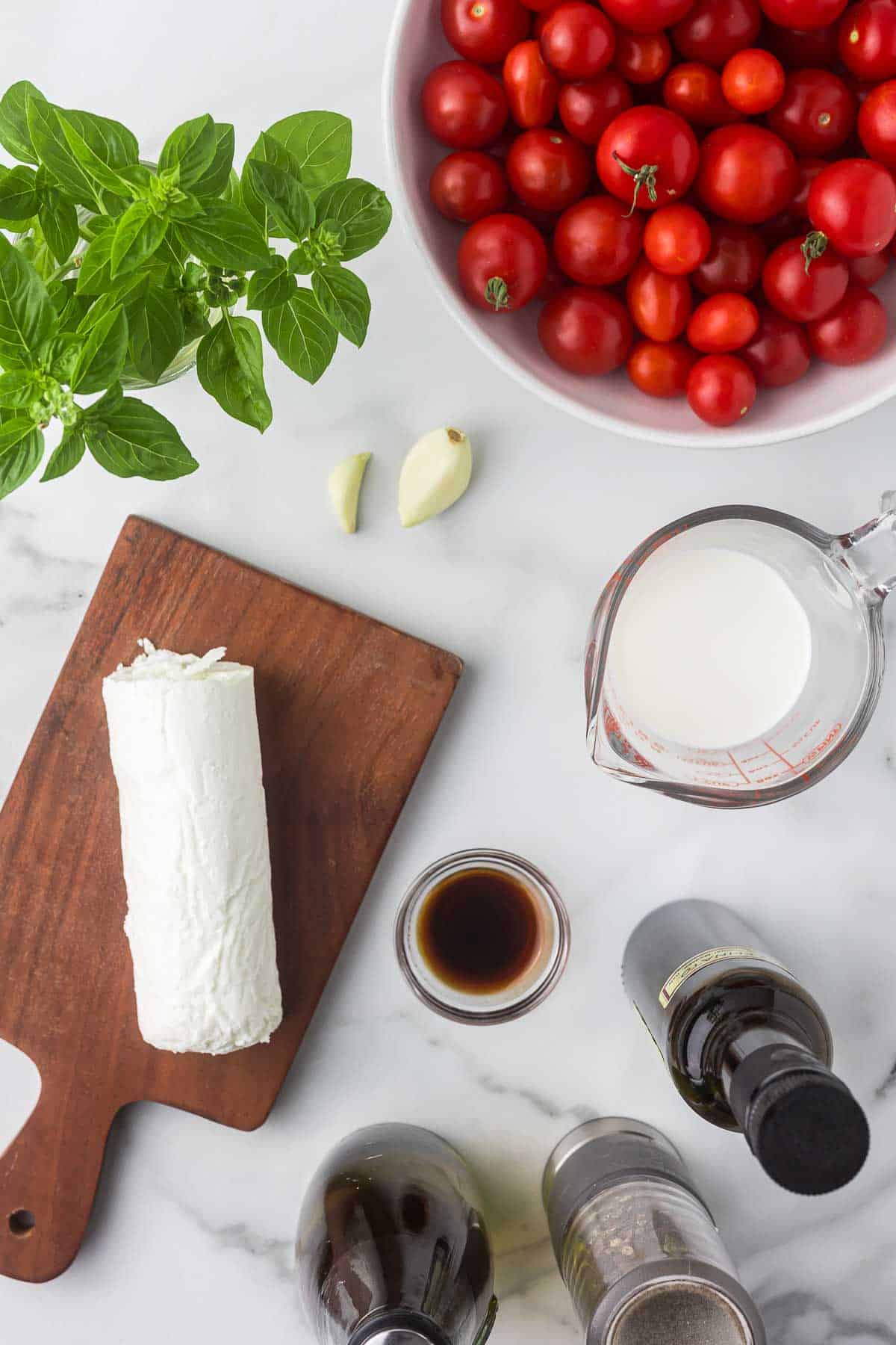 Ingredients to make goat cheese bruschetta dip.