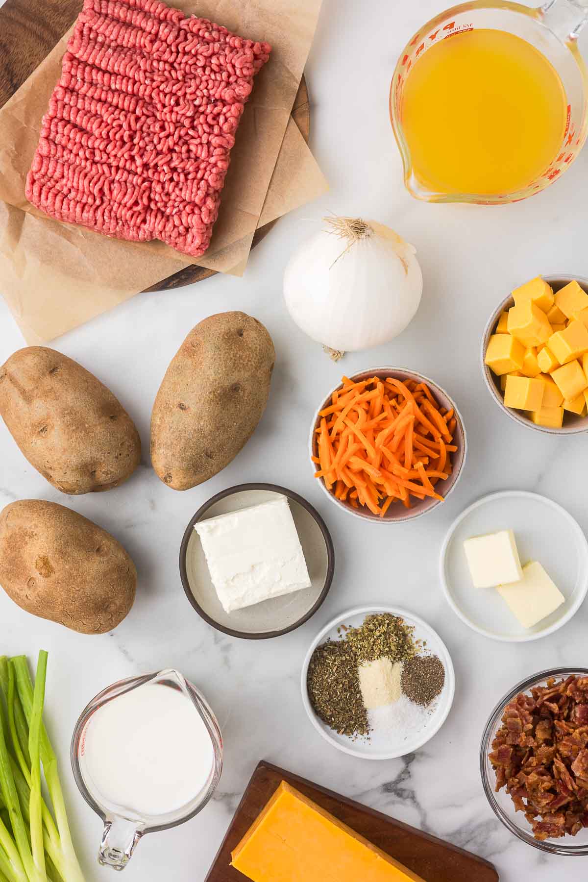 Ingredients to make cheesy hamburger soup.