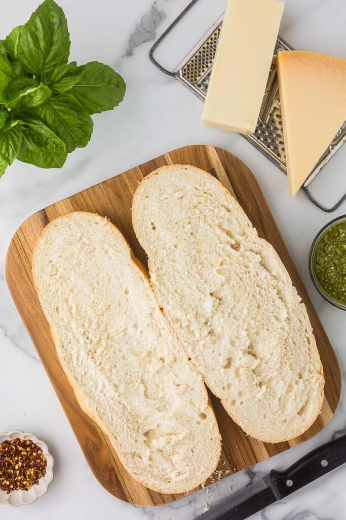 Italian bread cut length wise to make garlic bread.