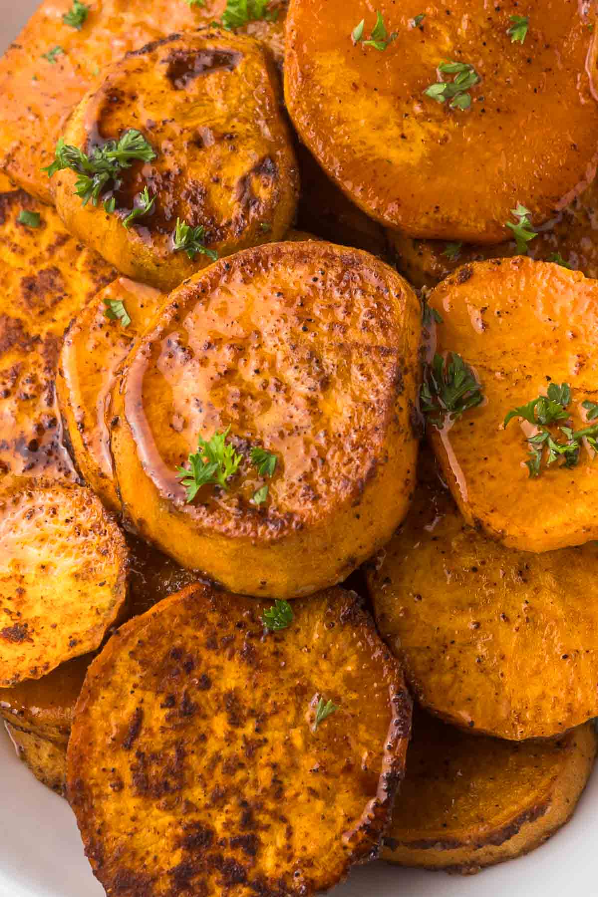 Roasted sweet potatoes with a maple syrup glaze.