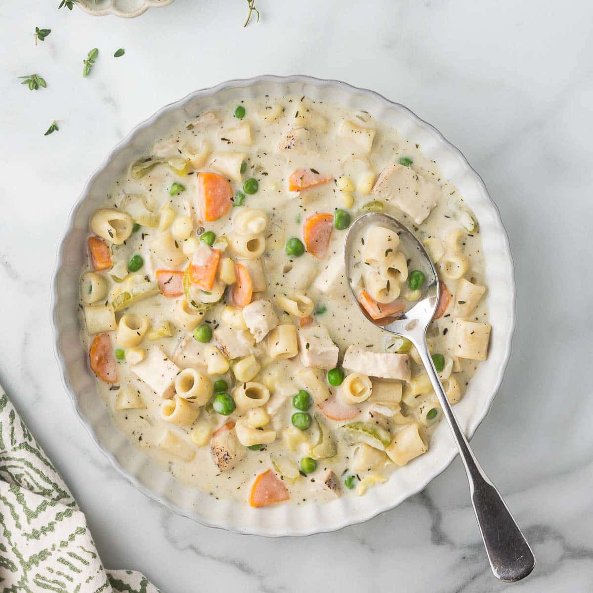 Bowl of soup with a spoon.