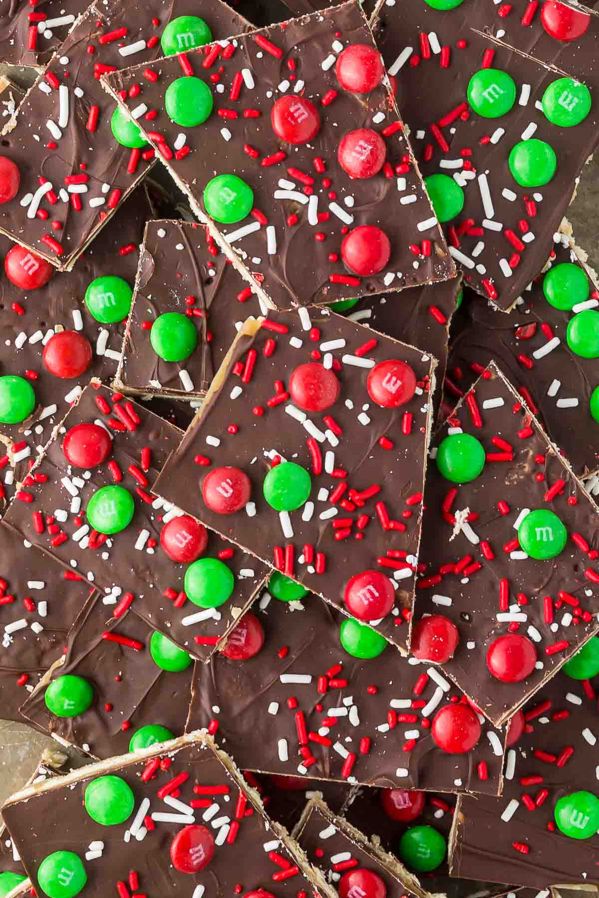 Christmas crack reicpe with red and green m&m's and sprinkles.