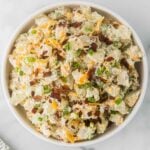 Steakhouse potato salad in a white bowl.