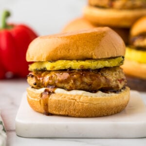 Ground chicken burgers with teriyaki sauce and grilled pineapple.