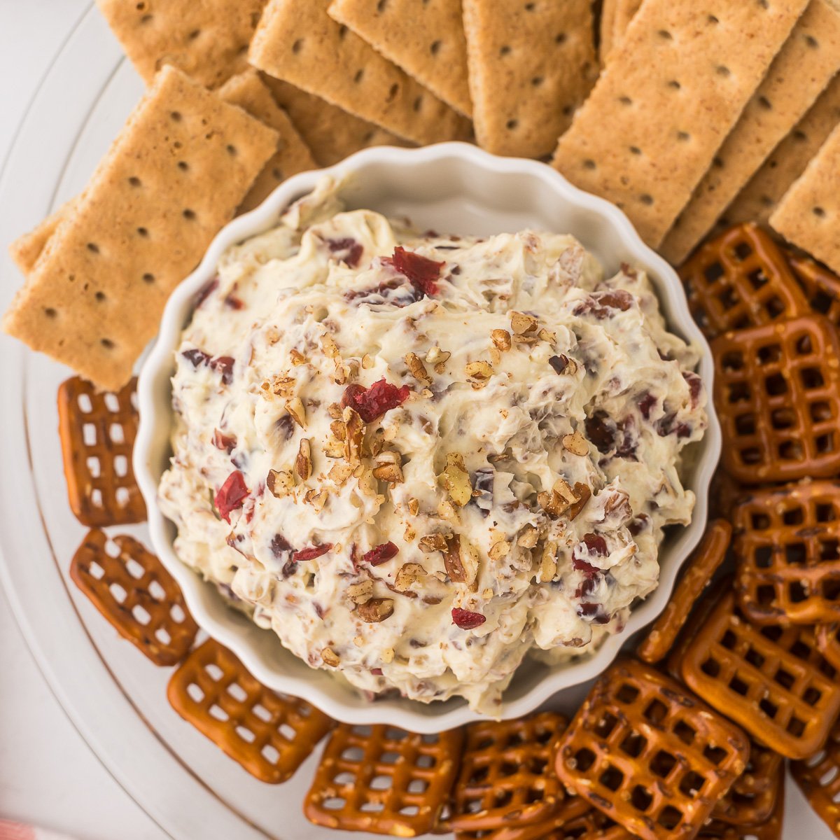 Orange Cranberry Cream Cheese dip with pretzels and graham crackers.