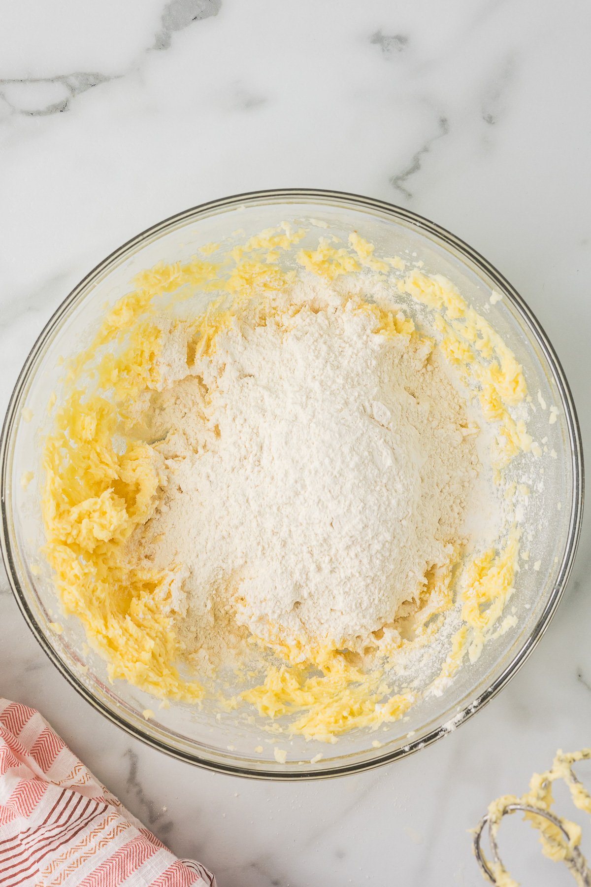 Dry ingredients added to sugar cookie dough before mixing to form cut out cookie dough.